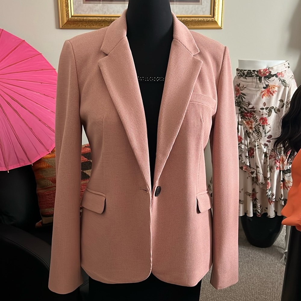 The jacket has spoken in a rich pink by Philosophy!